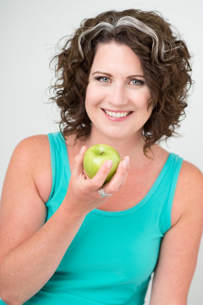 Vickie Dickson with an apple in her hand