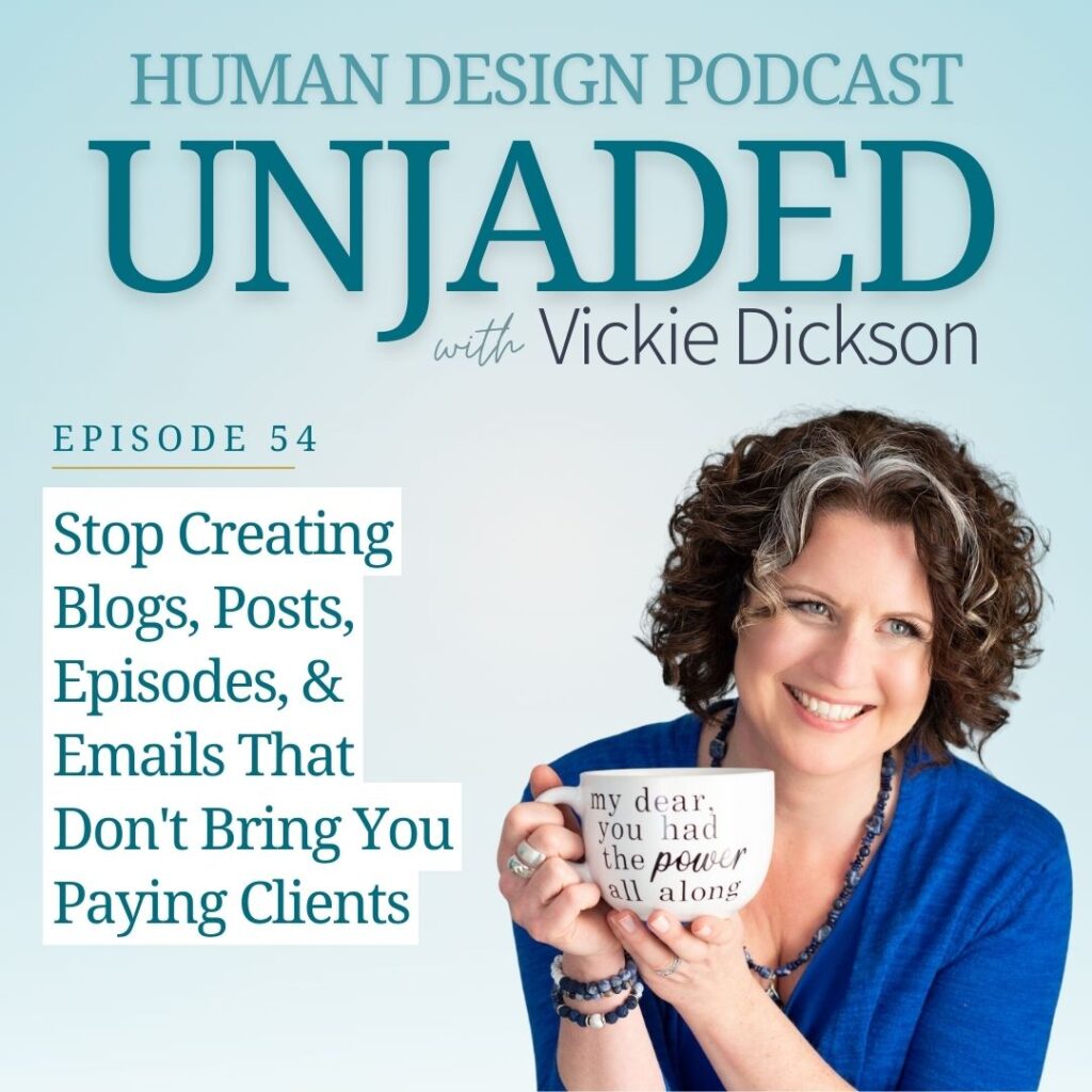 A photo of Vickie holding a mug that tells you what episode 54 is about on the Unjaded Podcast.  