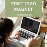 A woman working online with words that say How to Create your First Lead Magnet