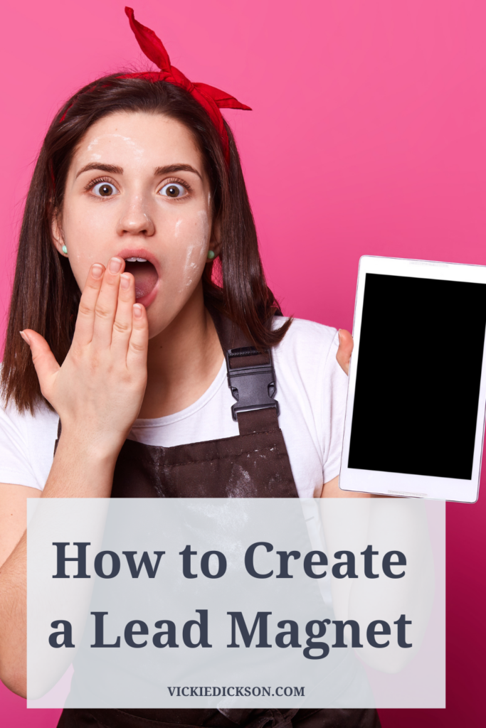 girl holding an ipad with the words how to create a lead magnet
