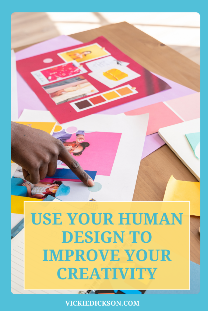 a table filled with creative projects with the words Use your Human design to Improve your Creativity.
